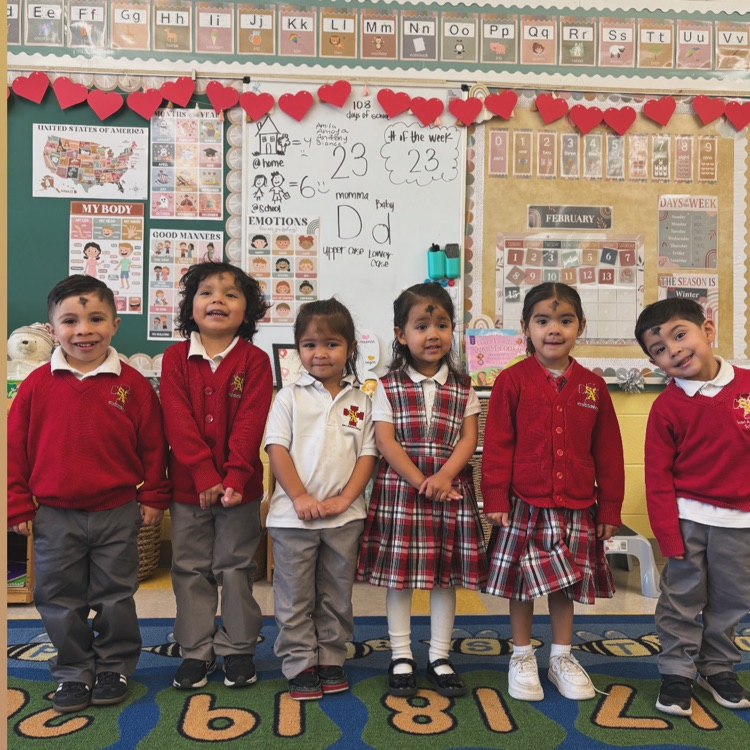 Our tiny tigers, marked with ashes and full of Jesus' love.