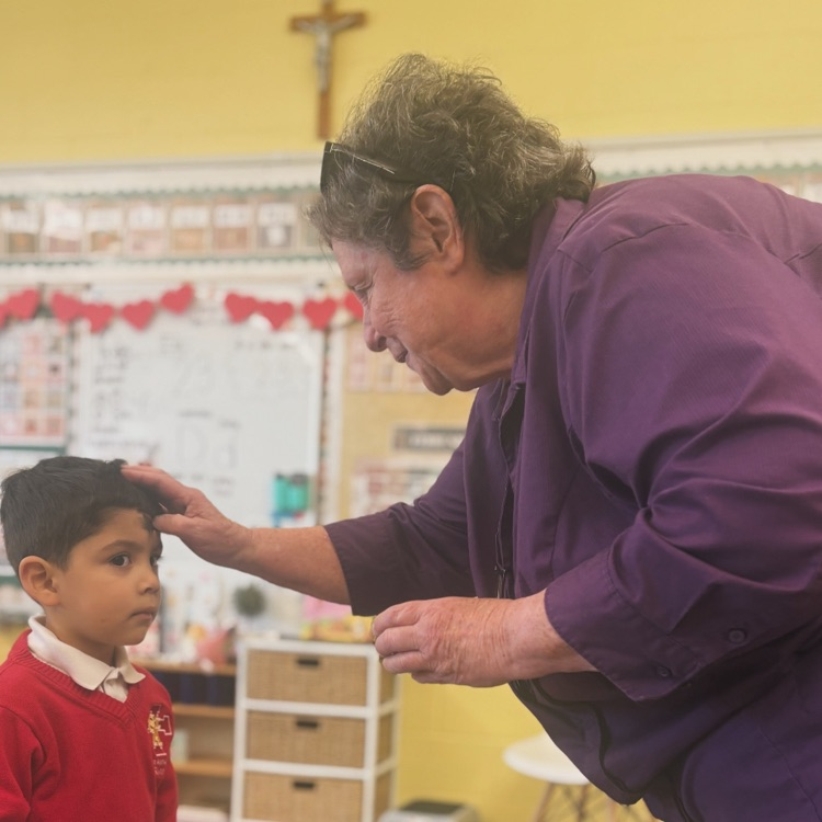 Our tiny tigers, marked with ashes and full of Jesus' love.