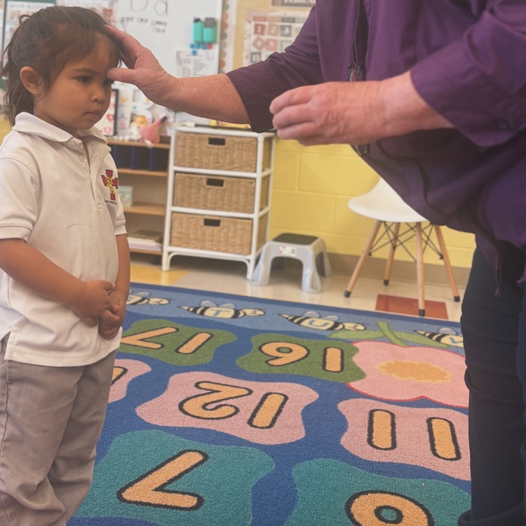 Our tiny tigers, marked with ashes and full of Jesus' love.