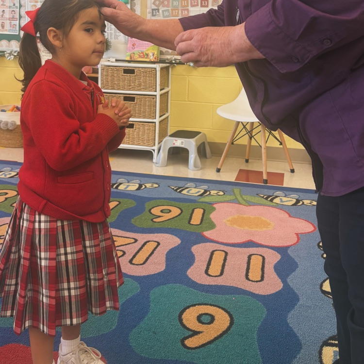 Our tiny tigers, marked with ashes and full of Jesus' love.