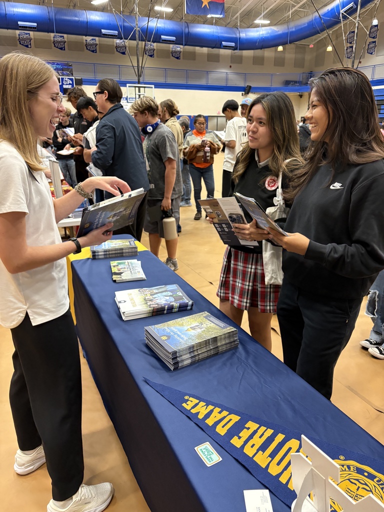Jennica Ahasteen & Shyanne Skeet with a Notre Dame rep