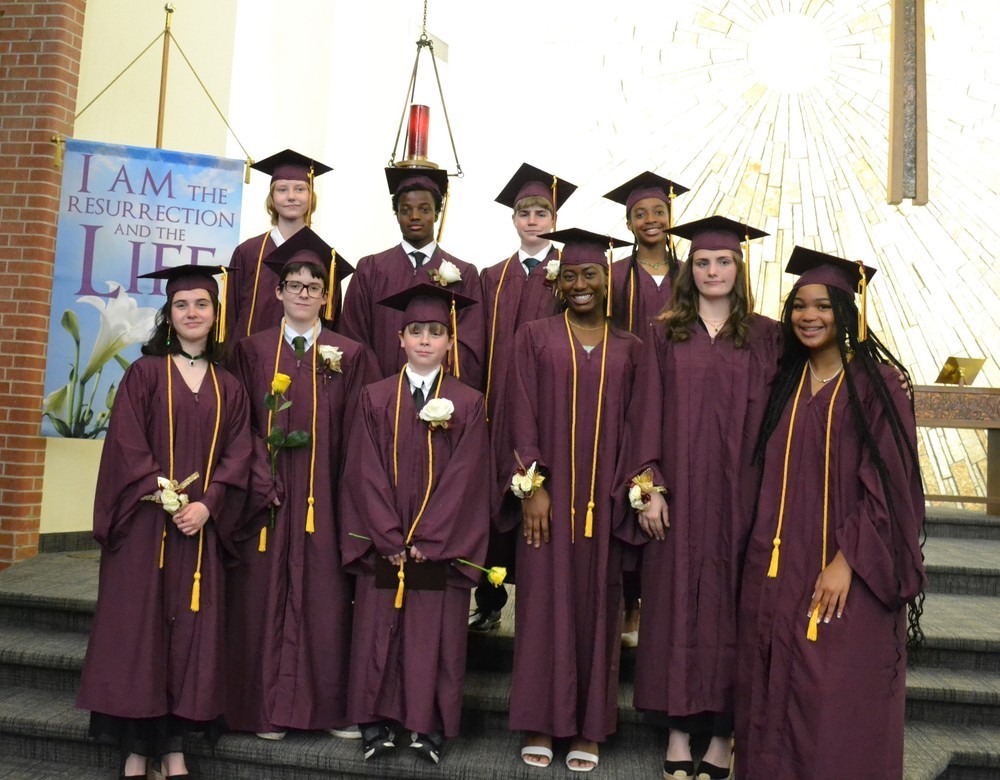 St. Paul Lutheran School students in graduation regalia.