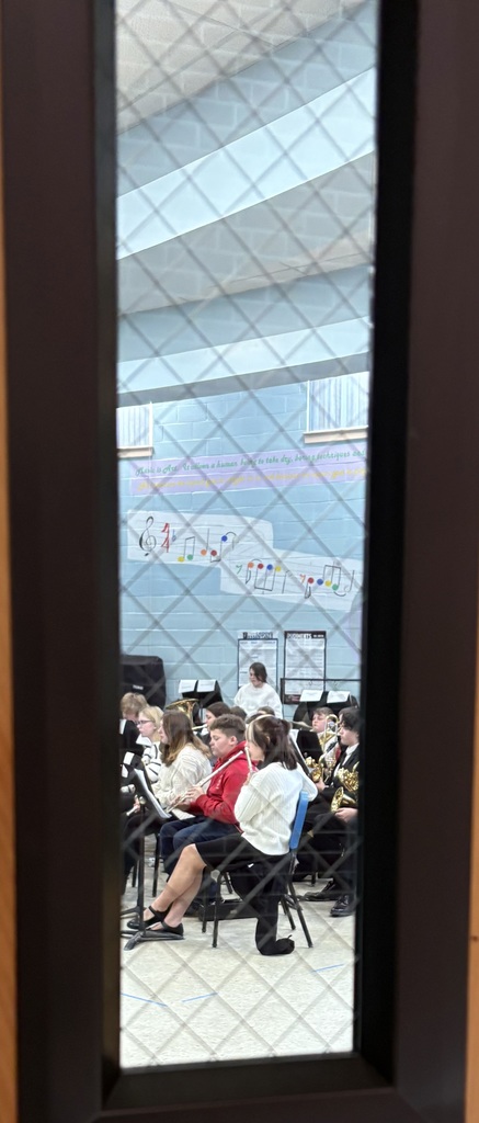 Kids sitting in chairs