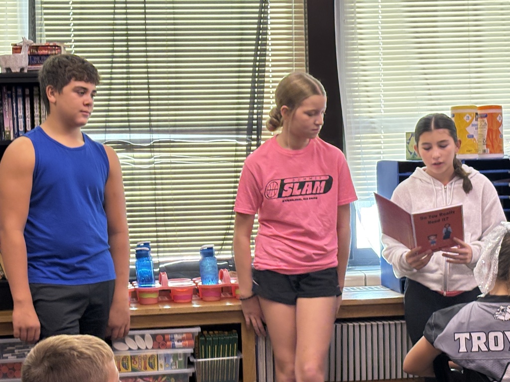 8th graders reading to 5th grade