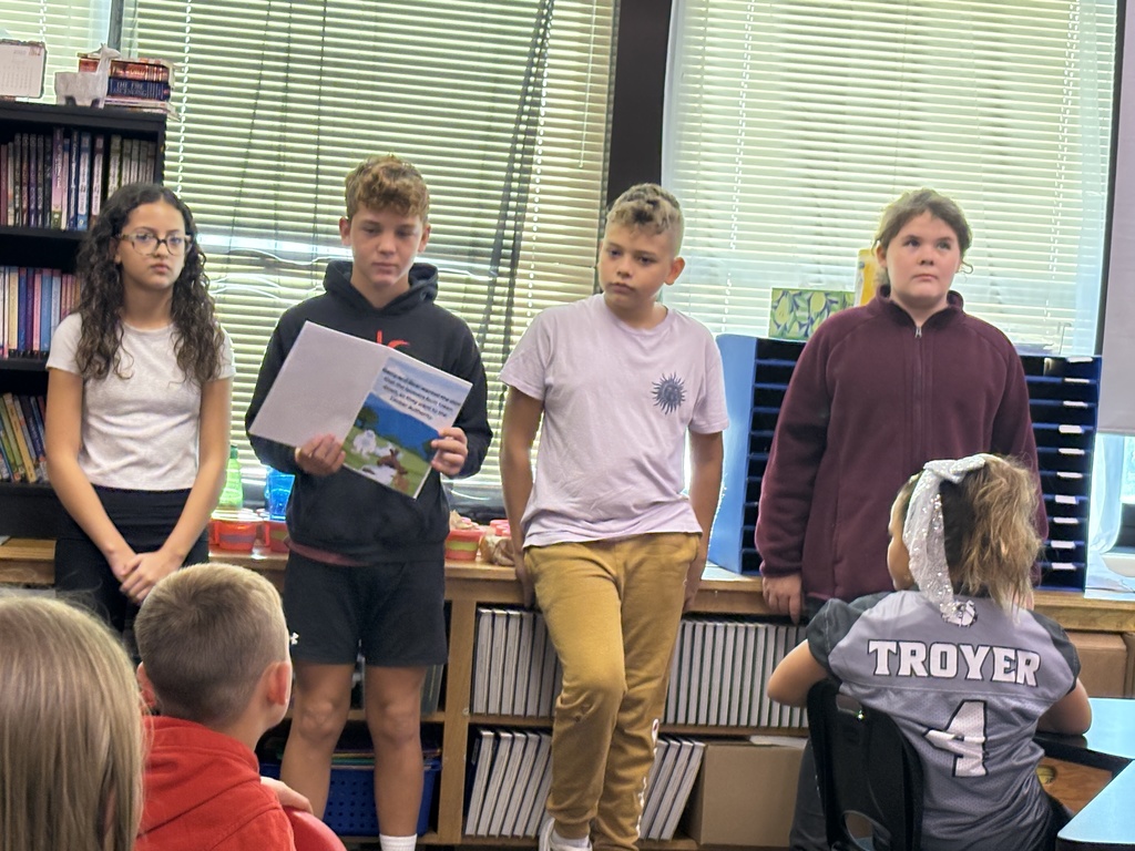 8th graders reading to 5th grade