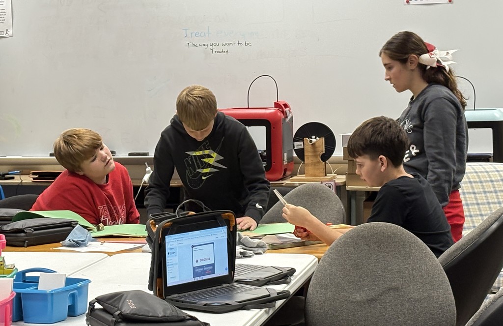 7th graders working in groups