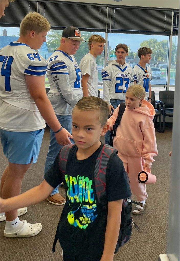 students high diving football players