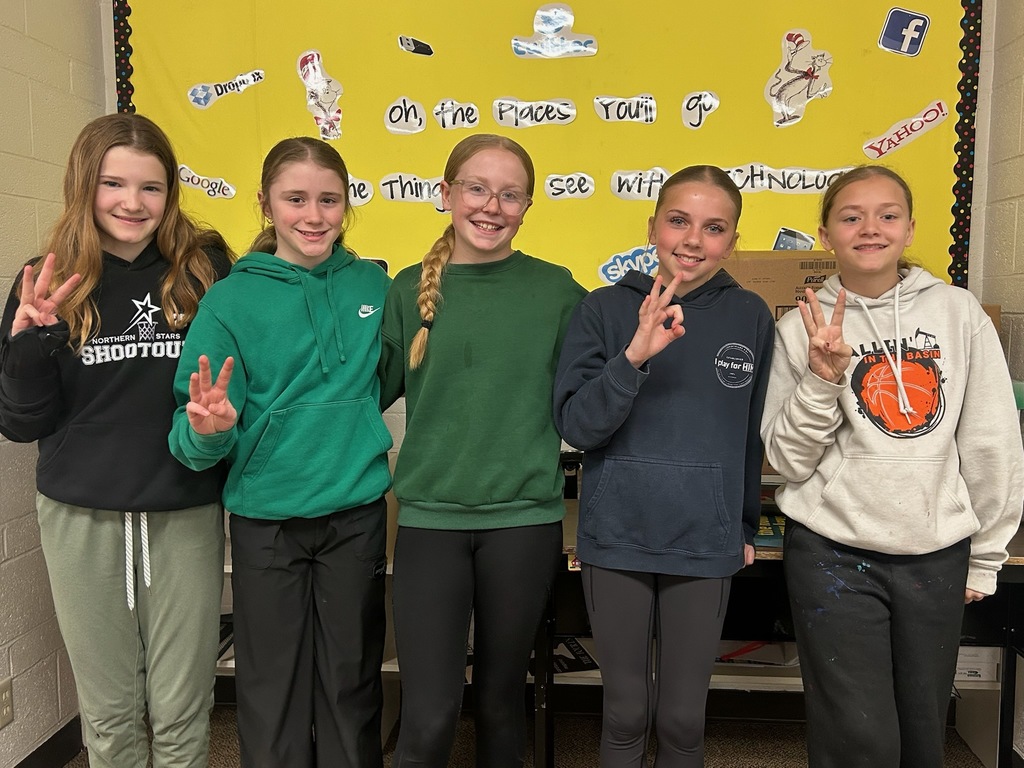 Group of 5 girls holding up 3 fingers