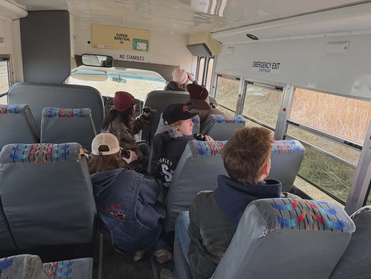 kids sitting on a bus