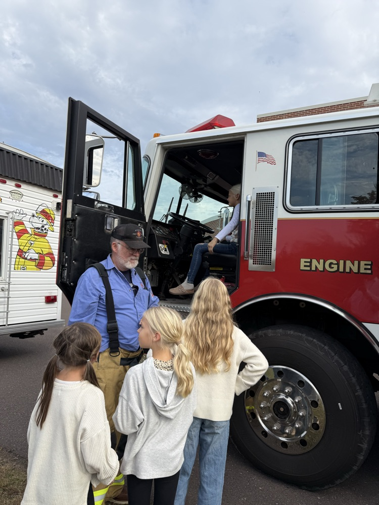 Fireman and fire truck.