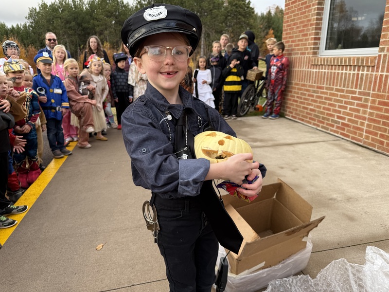 Showing off the pumpkin,
