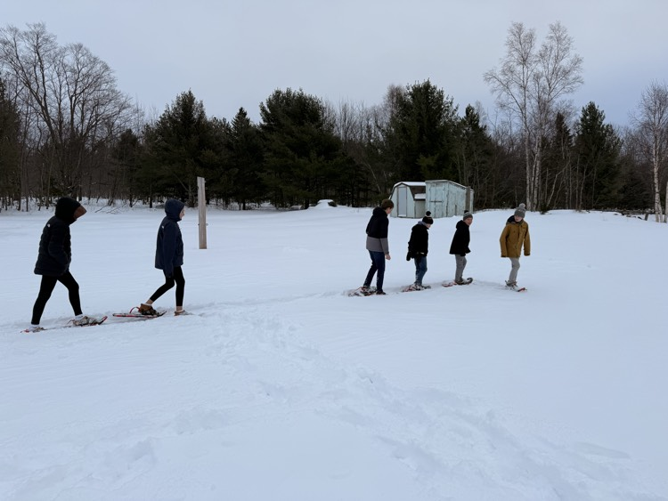 middle school students stomp out the perimeter of our rink.