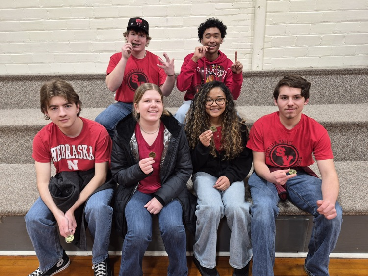 Stapleton Quiz Bowl had a great season. We won the Stapleton Invite (photo). Came in 3rd at the ESU 16 district meet (12 teams). Pictured our the Seniors Kempten Flores, Sheek Bruns, James Heinemann, Kelsey Amos, Rhay Bruns and Tucker Housman. 