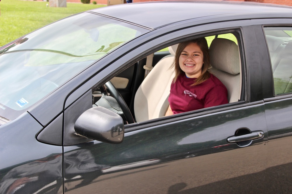 Ashley Gretzmacher learns she is the lucky winner of the Perfect Attendance automobile!