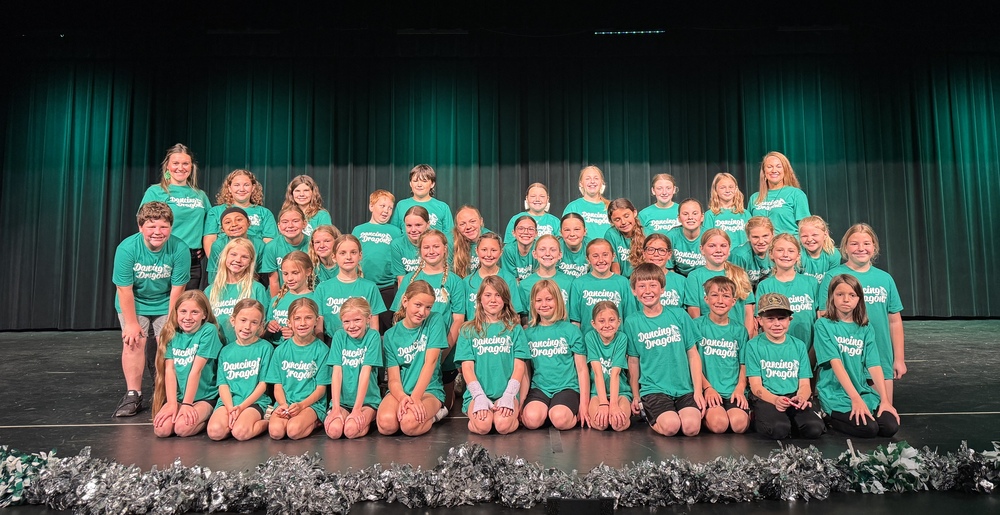 During the final week of school, the Ste. Genevieve Elementary Dancing Dragons dance team hosted an end-of-year celebration assembly for the entire school. Held at the Performing Arts Center, the event featured lively performances by our Dancing Dragons and our student tap dancers, summertime music, and interactive activities that brought students and staff together in a fun and festive atmosphere. The assembly included a variety of acts, such as a choreographed dance to the school song, a musical chairs competition with teachers and performances by the SGHS band and choir. The crowd joined in for a school-wide dance party to close out the event! The Dancing Dragons would like to thank everyone who supported their efforts and wish all students and families a safe and happy summer break!