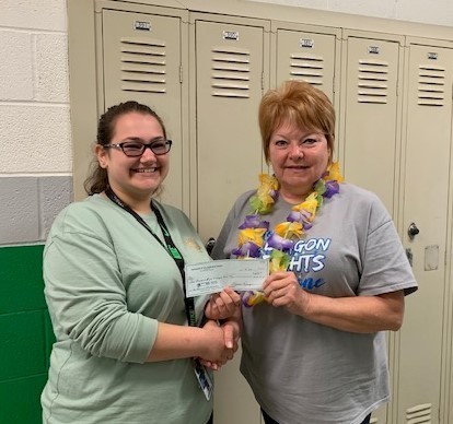 Mary Skaggs receives a check from Ste. Genevieve County Fair Board Treasurer Martha Resinger.