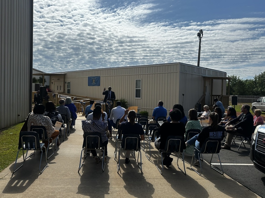 Dr. Robinson addresses the community at the Ribbon Cutting for new school-based clinic