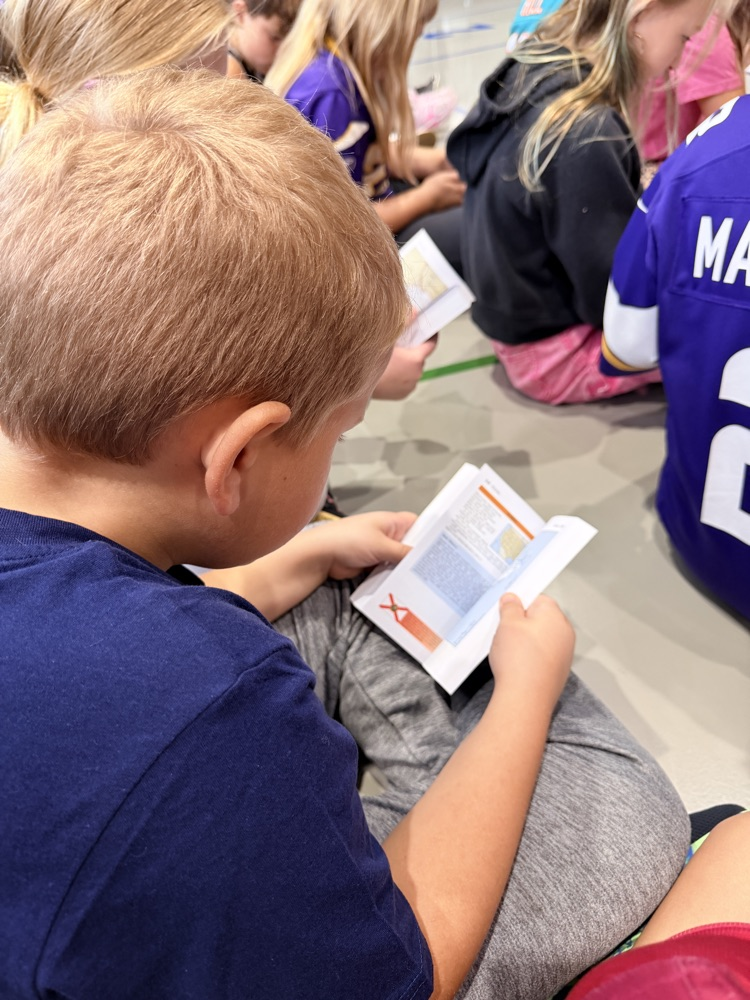 3rd grader exploring their new Atlas 