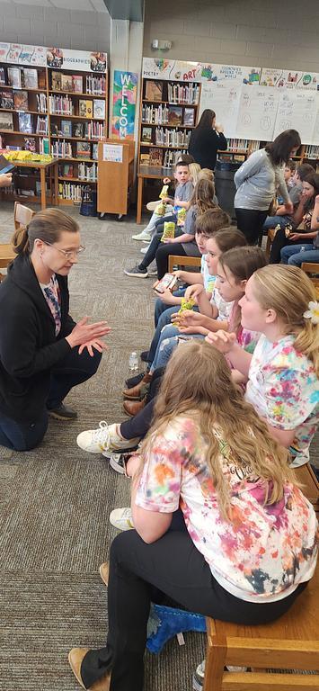 Mrs. Moore coaching the team during break.