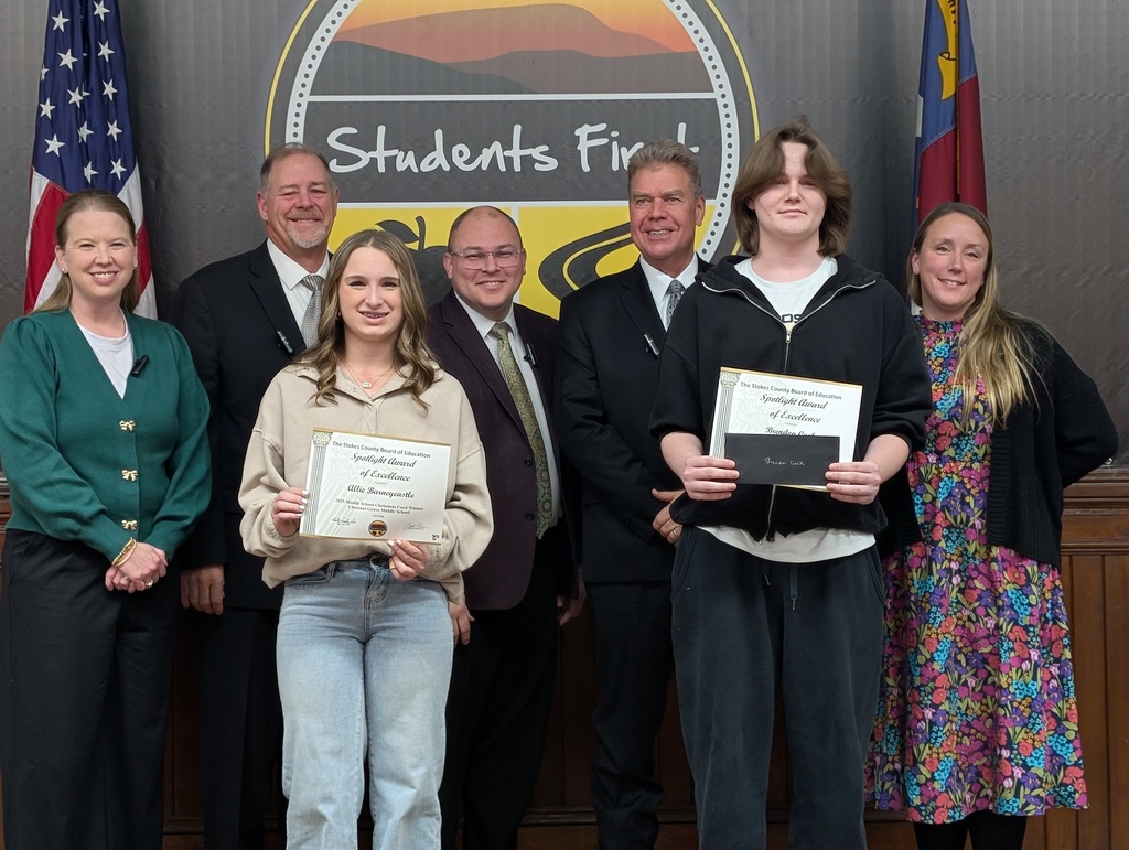 Allie Barneycastle and Brendon Cook with School Board members