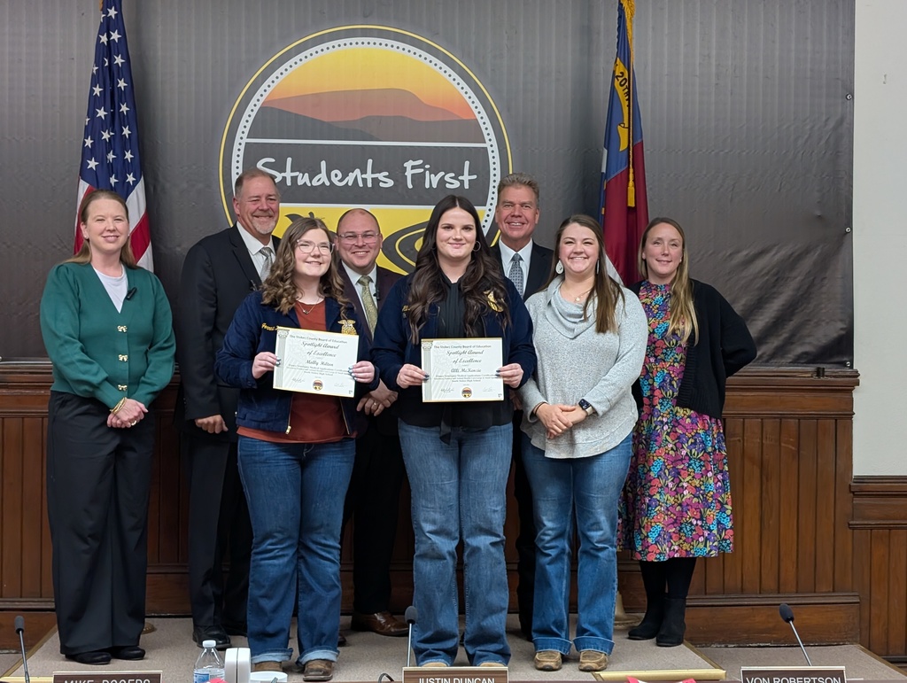 Molly Hilton & Alli McKenzie with school board members