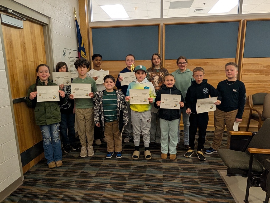 The  spelling bee participants  from each elementary  and middle schools