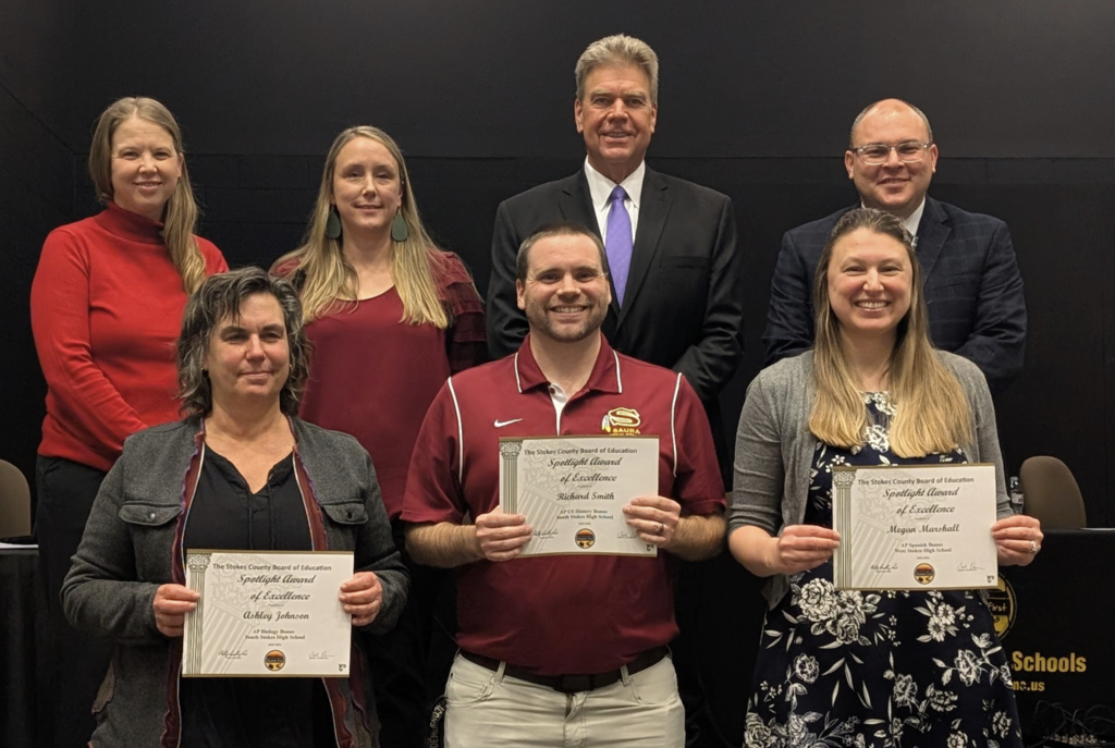Stokes County Board of Education  members with a couple of of teachers who were recognized for  Teacher Performance Bonuses for Advanced Placement (AP) Courses