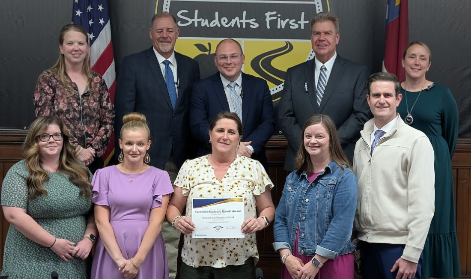 Mr. Bryant and staff with the board of education members.