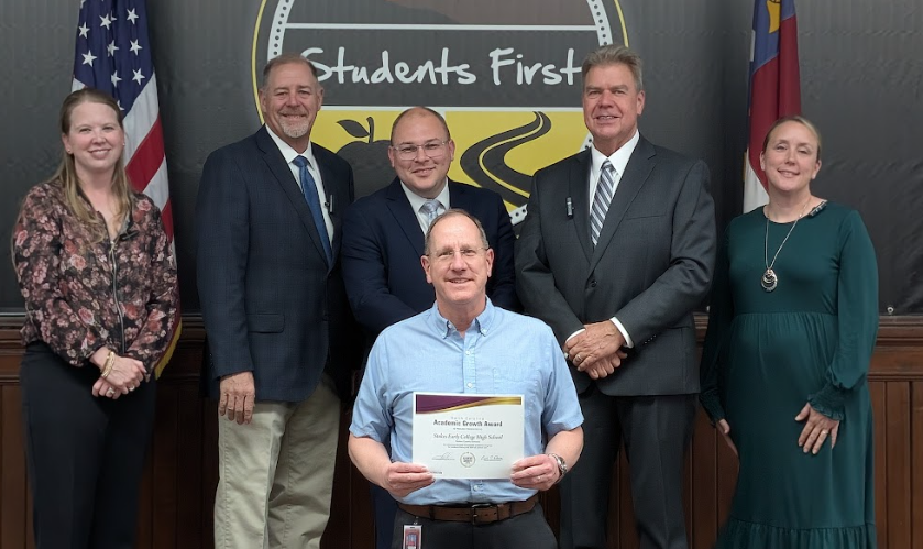 SEC admin with board of education members