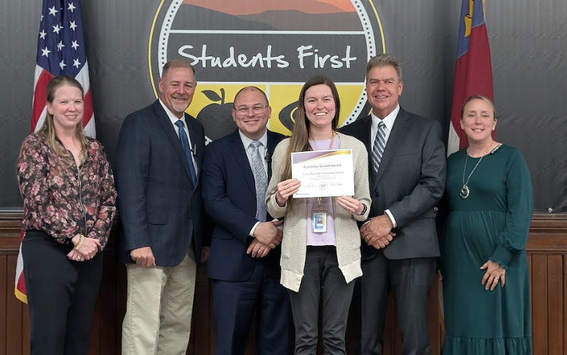 NRES teacher with board of education members