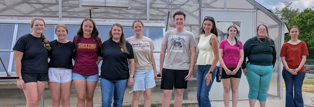 Sawyer Ferguson with students 