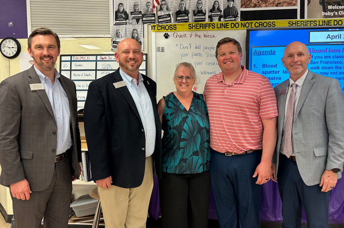 Kelili Doby CTE teacher of the year with admin and Central office staff