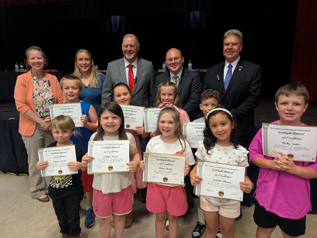 Math fair winners with BOE members