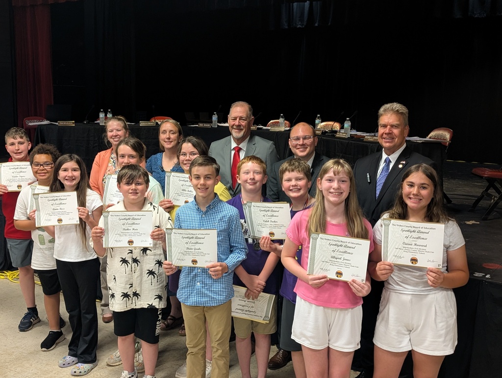 Math fair winners with BOE members