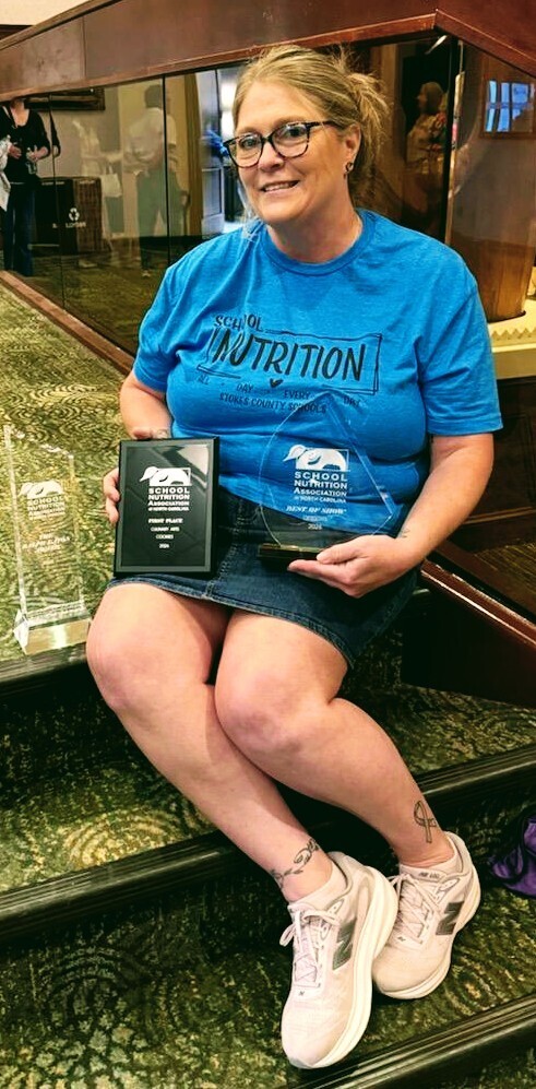 Tina Mabe with her awards