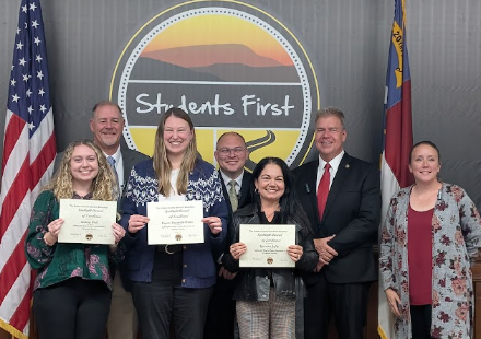 Yasmint Jaffe, Audrey Wall, and Megan Marshall-Wicker with the BOE members