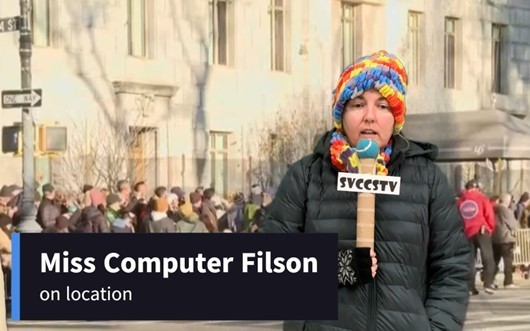 announcer in front of green screen