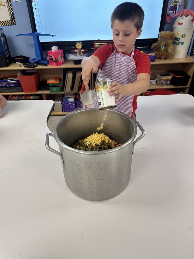adding corn to stone soup