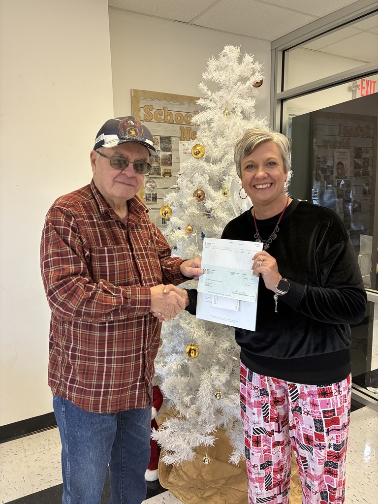 Mr. Bob Martin, Sullivan Masonic Lodge No. 69 and Dr. Kathy Vandegriffe, Superintendent, Strain-Japan R-XVI School