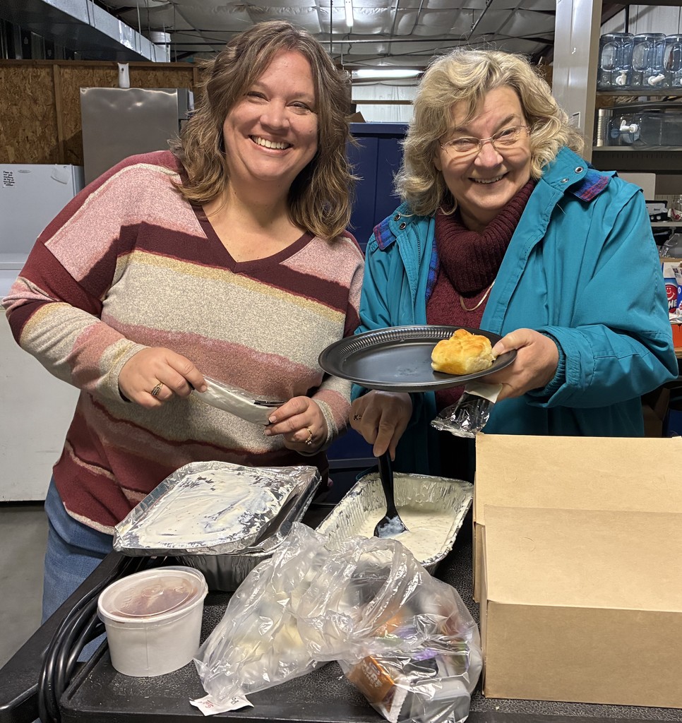 Mrs. Wilson & Mrs. Songer enjoying some biscuits & gravy