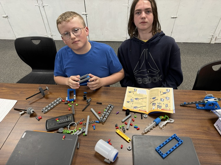 7th grade students (Jackson and Ashton) building legos in exploratory 
