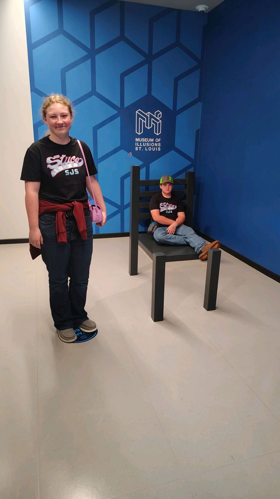 students at the museum of illusions