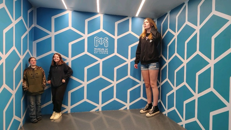 students at the museum of illusions