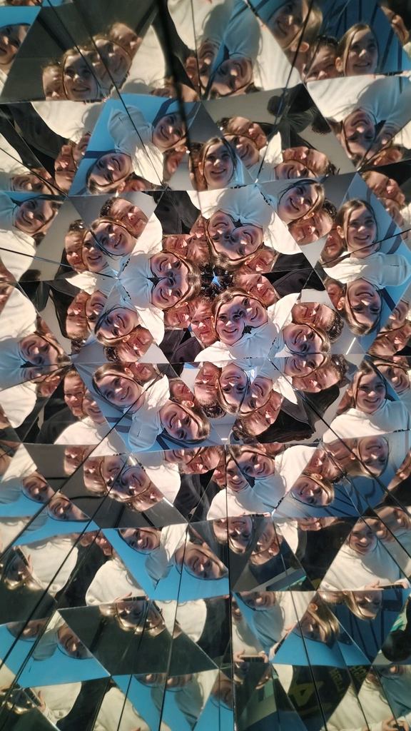 students at the museum of illusions