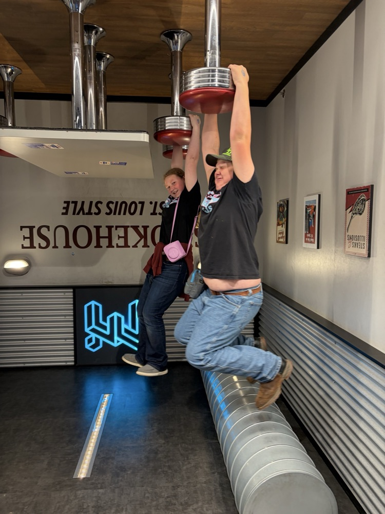 students at the museum of illusions