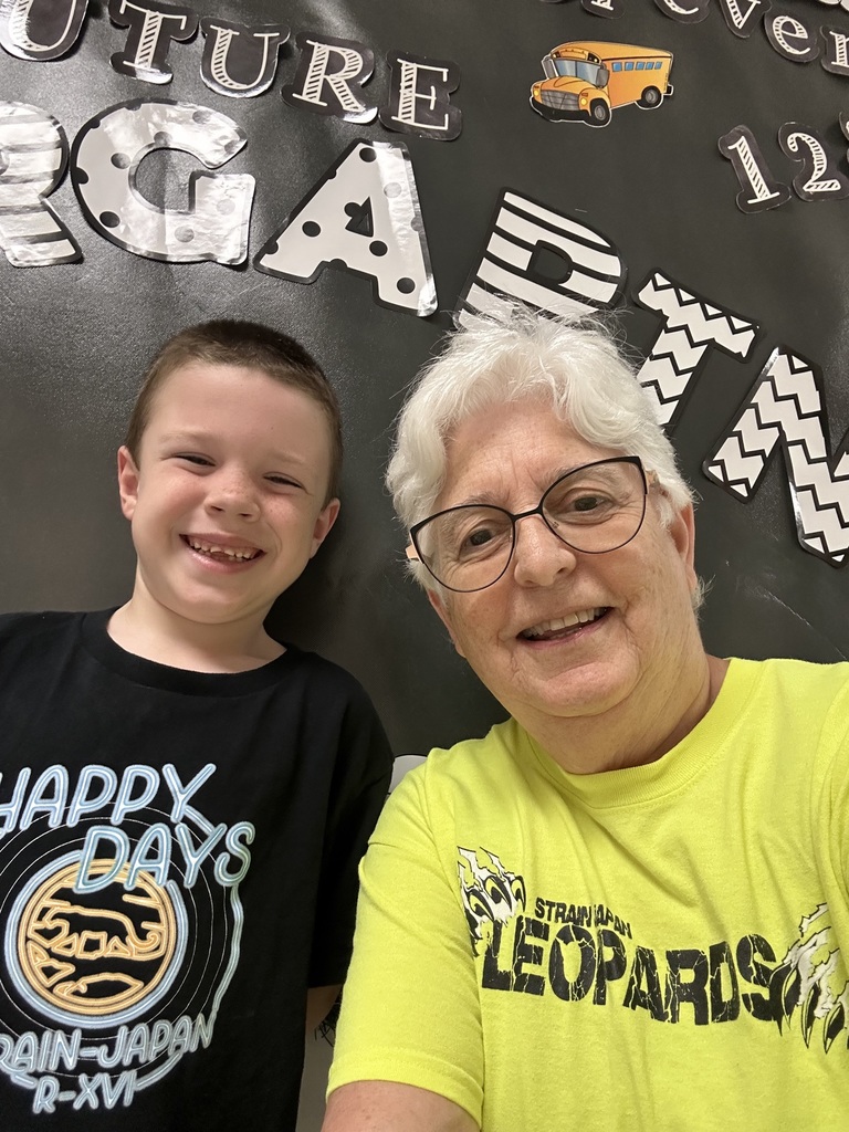 kindergarten teacher Mrs. Meek and a student for leopard day