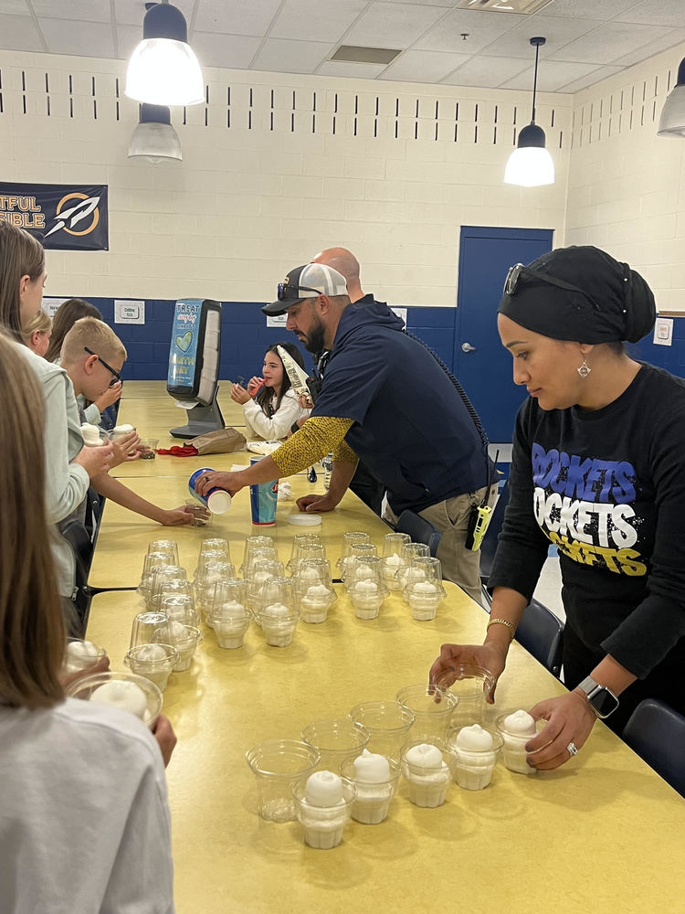 Staff passing out treats
