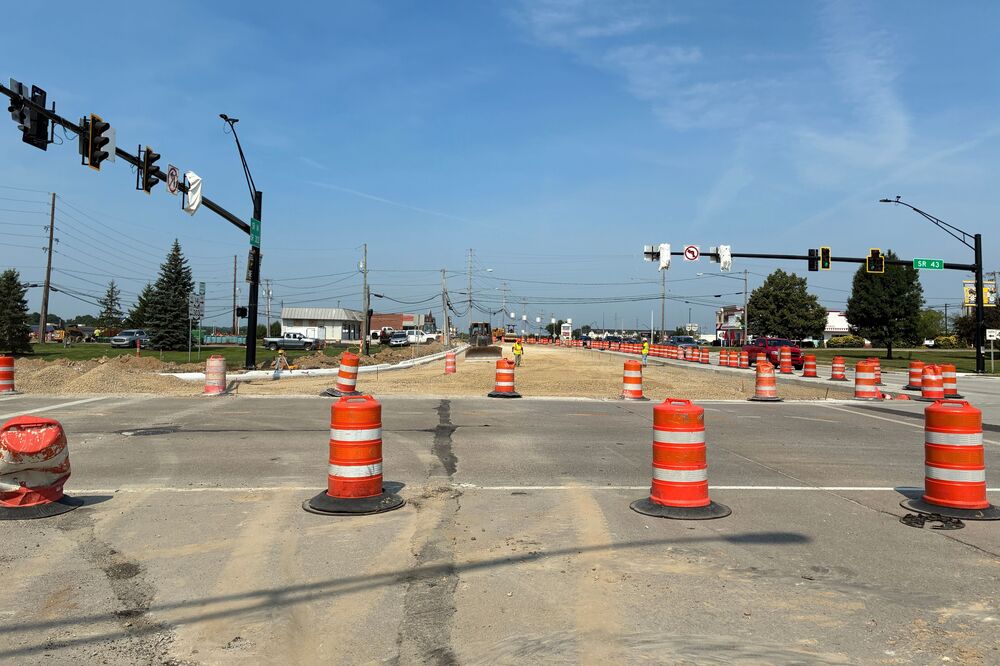 Orange barrels in road intersection
