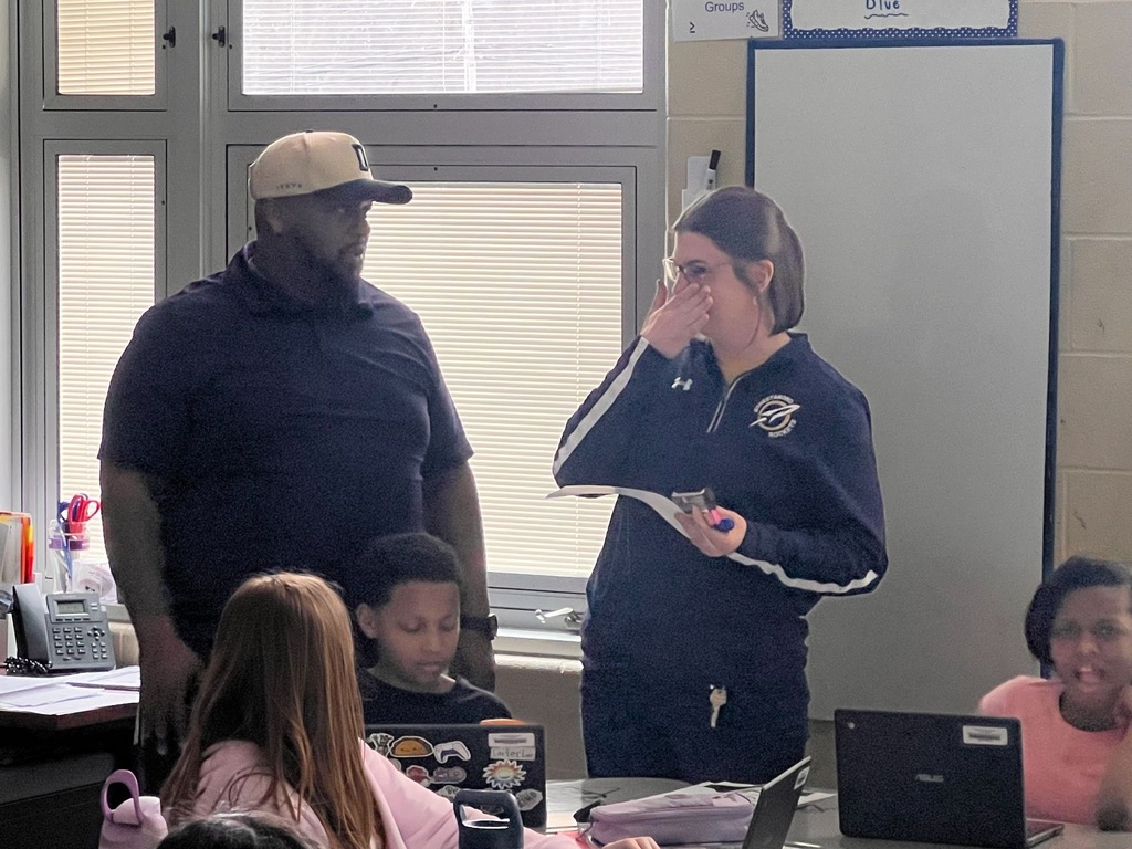 Mrs. Spence receiving her award. 