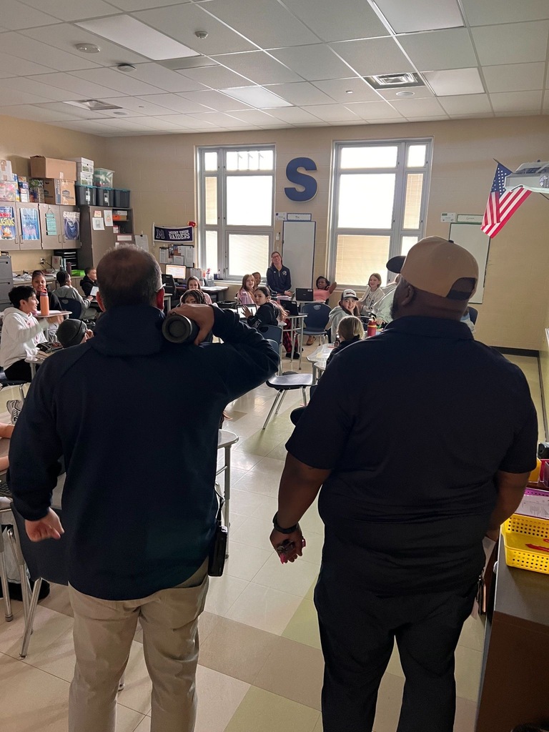  Mrs. Spence holding her award. 
